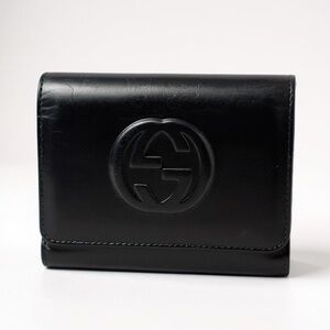 Gucci Black Embossed Logo Leather Wallet